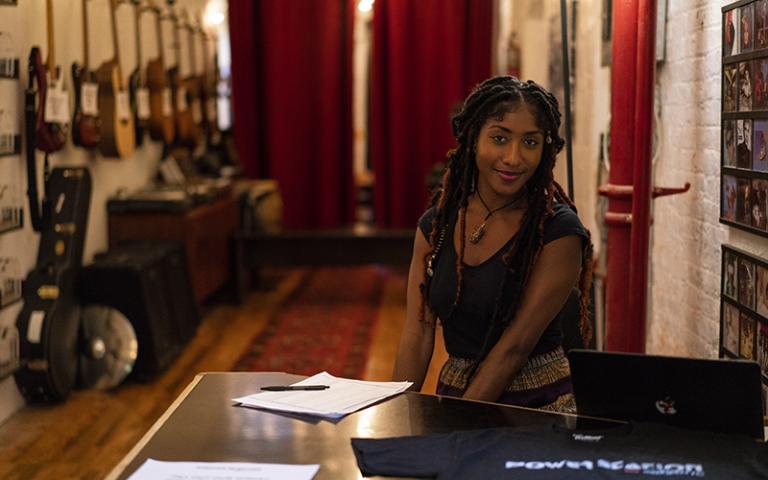 Person at desk on Berklee NYC campus