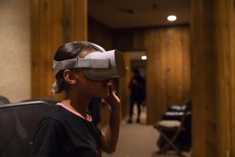 Student wearing a virtual reality headset