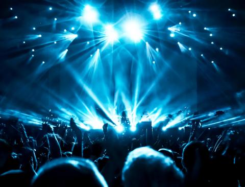 A stage lit in blue lights