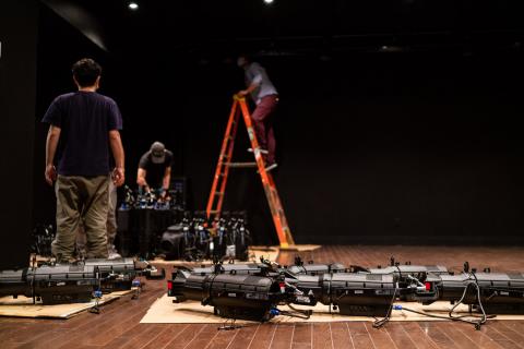 Grad assistants working on a stage at the Berklee NYC campus